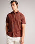 CHAPLN-Shirts-How can CHAPLN look this good? The secret is all in the details: a relaxed fit, short sleeves and an intricate coral print. If you love laid-back style and the comfort of linen, then this shirt is for you.This product is made from European Flax Linen. It is farmed using no irrigation and no pesticides, helping to reduce water and chemical usage. Button up shirt 100% Linen Short sleeved Coral print Classic collar Relaxed fit James is 6'0" / 1.83m and wears Maroon in a size 3- Ted Baker Romania